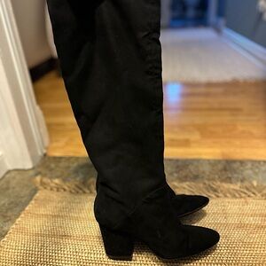 Knee high heeled boots